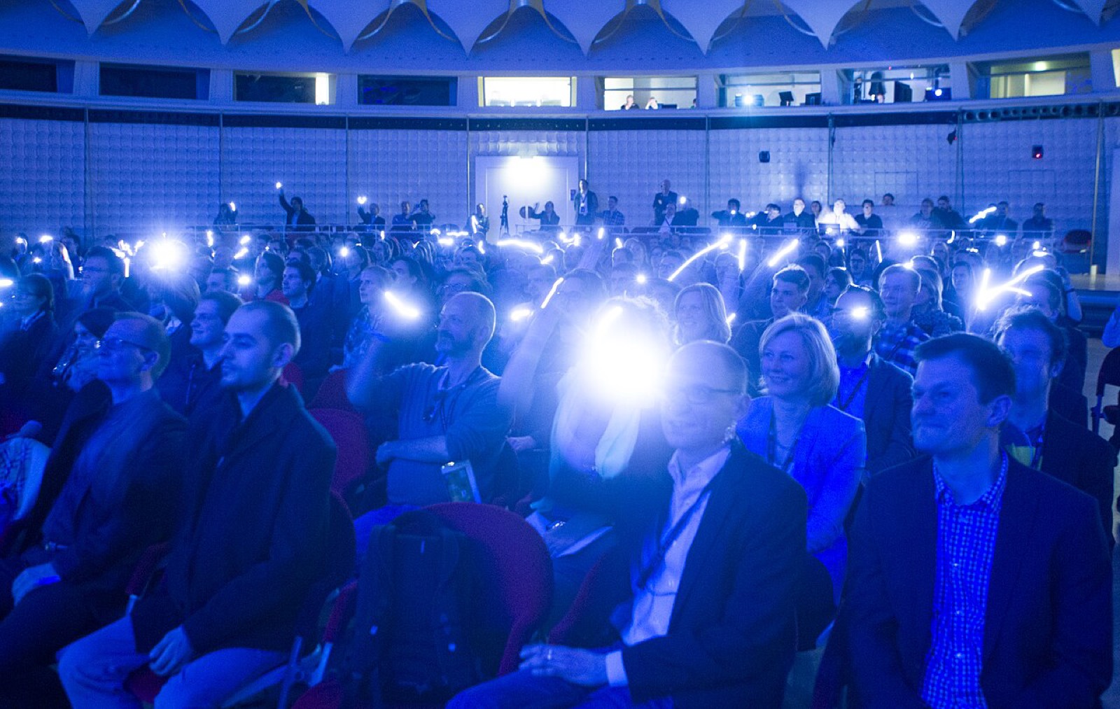 Audience seated in a conference hall