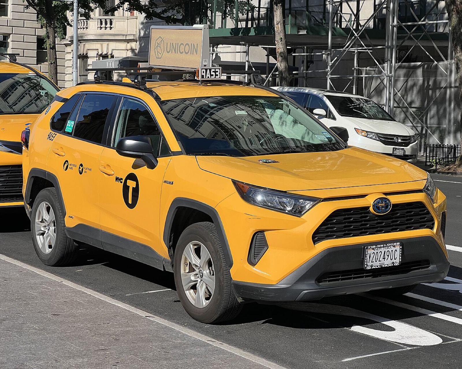 Yellow taxi cab on a city street